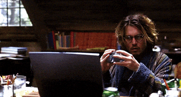 在家上班的gif-Bored Johnny Depp GIF