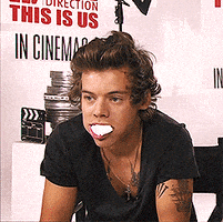 你说的都对的gif-harry styles shrug GIF