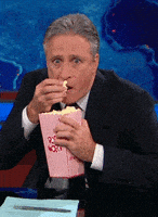 真好笑的gif-Jon Stewart Popcorn GIF