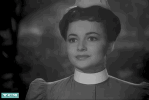 每日GIF(2020-07-27)的gif-Olivia De Havilland Wink GIF by Turner Classic Movies