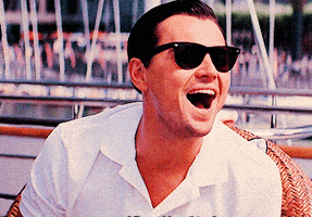 每日GIF(2021-02-01)的gif-Wolf Of Wall Street Laugh GIF